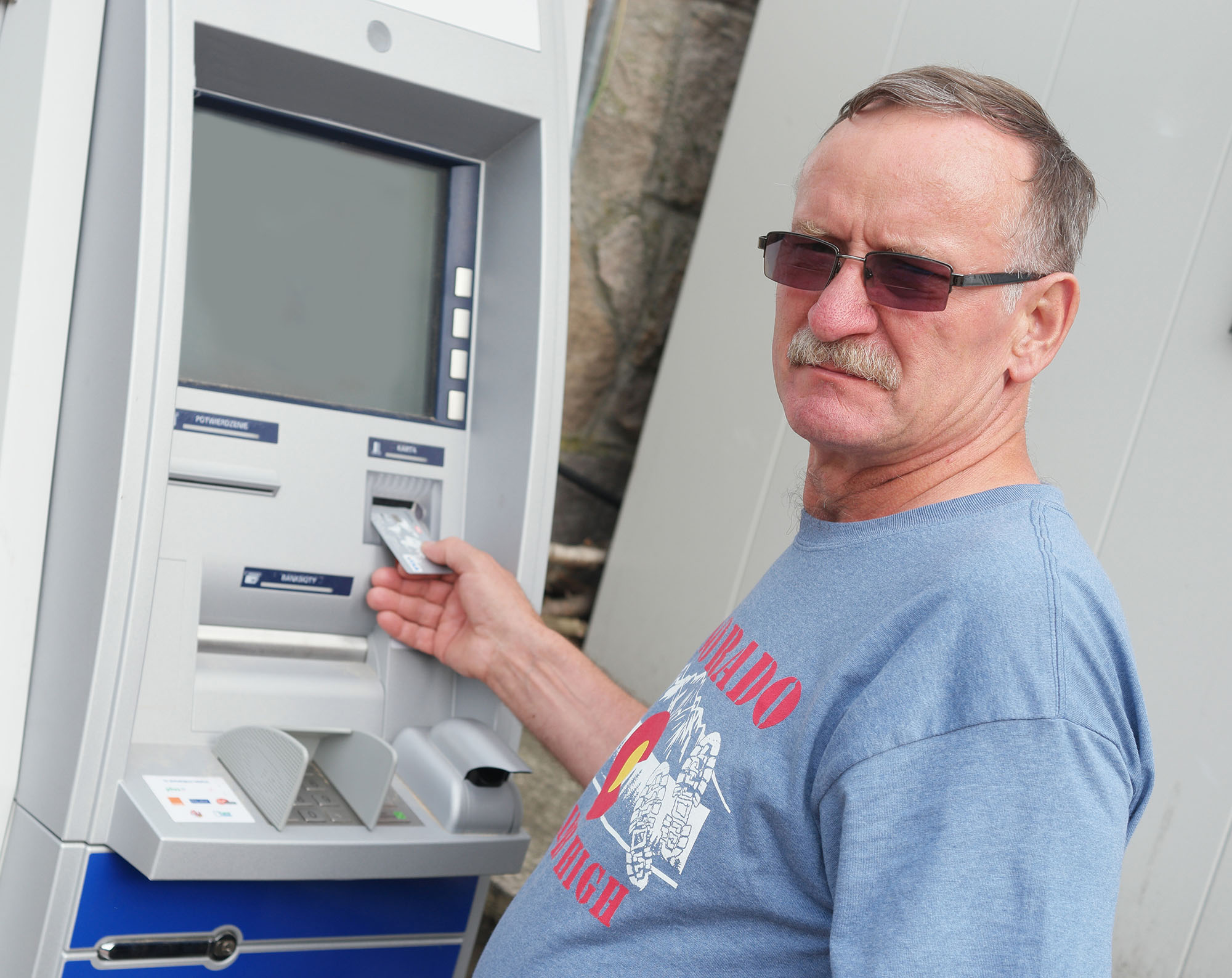 central sunbelt - one of the largest free atm networks in the country.  Compare to your bank ATM network to avoid ATM fees.  Man standing at ATM