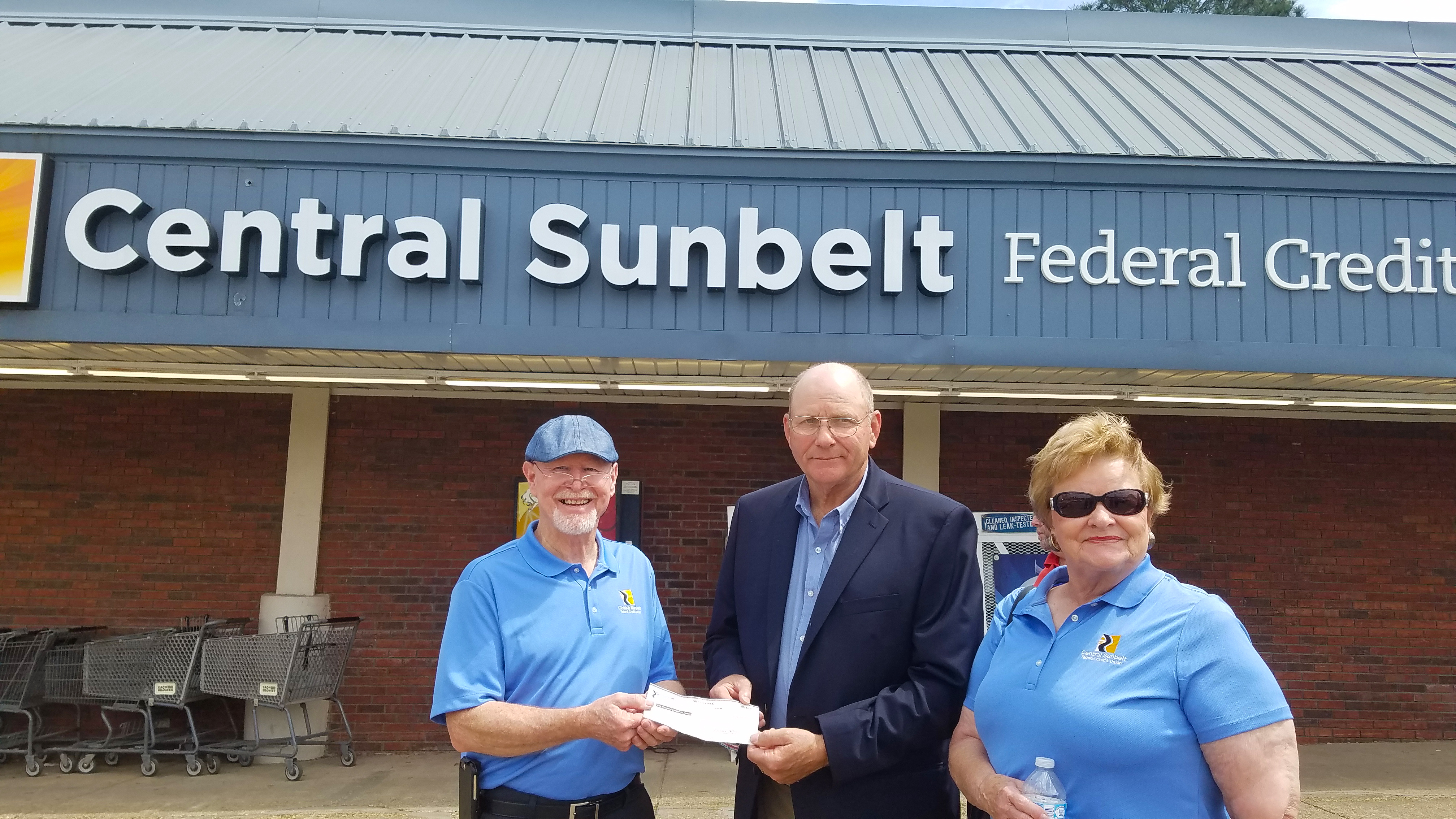 Central Sunbelt donating $1000 to the Ellisville Fire Department - Ellisville Grand Opening